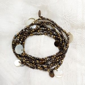 Set of 8 Beaded Gold Tone Shell Coin Bracelets